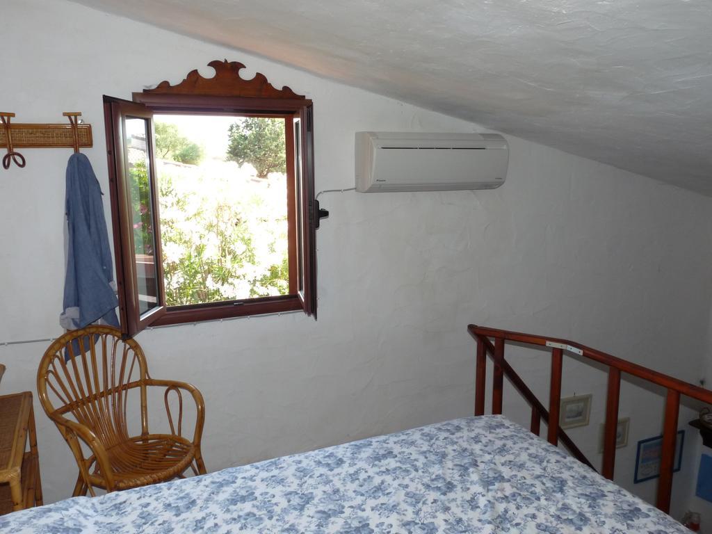 Monolocale San Teodoro Apartment Сан Теодоро Стая снимка